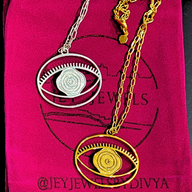Evil Eye Pendant Necklace Medium - Silver – elegant pendant necklace with spiritual meaning by Jey Jewels by Divya
shown with a gold variation on pink background