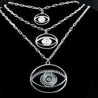 Evil Eye Pendant Necklace Medium - Silver – elegant pendant necklace with spiritual meaning by Jey Jewels by Divya
Shown with two size variations on black background