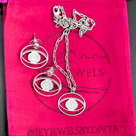 Evil Eye Pendant Necklace Medium - Silver – elegant pendant necklace with spiritual meaning by Jey Jewels by Divya
Show with a pair of Earrings on pink background