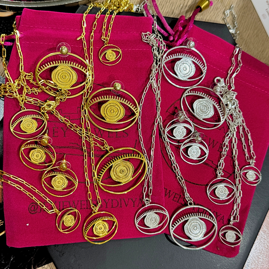 Evil Eye Dangling Bracelet Medium - Silver – handcrafted gold or silver charm bracelet by Jey Jewels by Divya
Show with all Evil Eye products in Gold and Silver