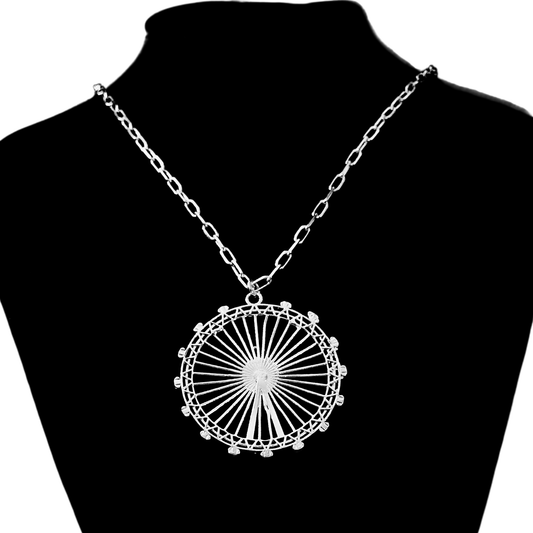 London Eye Large Necklace – Silver – Circular design inspired by the London Eye – a modern symbol of London’s skyline, architectural jewellery on black background