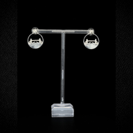 Tower Bridge Medium Earrings – Silver – Intricate detailing inspired by London’s Tower Bridge – heritage architecture in wearable form on black background