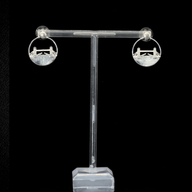 Tower Bridge Medium Earrings – Silver – Intricate detailing inspired by London’s Tower Bridge – heritage architecture in wearable form on black background