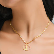 Big Ben Medium Necklace – Gold – Pendant or earrings inspired by London’s iconic Big Ben tower – elegant architectural design on model neck zoom in