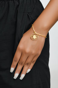 Evil Eye Dangling Bracelet Medium - Gold – handcrafted gold or silver charm bracelet by Jey Jewels by Divya on model hand