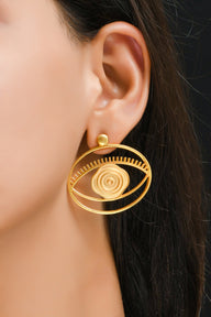 Evil Eye Stud + Hoop Earrings Large - Gold – symbolic stud or hoop earrings designed by Jey Jewels by Divya on model ear zoomed in shot