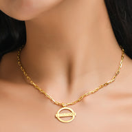 London Medium Necklace – Gold – A tribute to London’s essence – elegant handcrafted jewellery inspired by its iconic cityscape, styled on a model neck zoom in