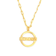 London Medium Necklace – Gold – A tribute to London’s essence – elegant handcrafted jewellery inspired by its iconic cityscape, styled on a white backdrop zoom in