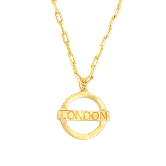 London Medium Necklace – Gold – A tribute to London’s essence – elegant handcrafted jewellery inspired by its iconic cityscape, styled on a white backdrop zoom in