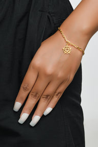 Pentacle Dangling Bracelet Small - Gold – handcrafted gold charm bracelet by Jéy Jewels by Divya on model hand