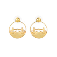 Tower Bridge Medium Earrings – Gold – Intricate detailing inspired by London’s Tower Bridge – heritage architecture in wearable form on white background