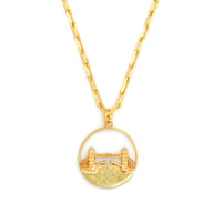 Tower Bridge Medium Necklace – Gold – Intricate detailing inspired by London’s Tower Bridge – heritage architecture in wearable form on white background zoom in