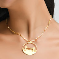 Tower Bridge Large Necklace – Gold – Intricate detailing inspired by London’s Tower Bridge – heritage architecture in wearable form on model neck zoom in