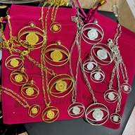 Evil Eye Pendant Necklace Medium - Silver – elegant pendant necklace with spiritual meaning by Jey Jewels by Divya
Shown with all Evil Eye products and sizes on pink background