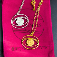 Evil Eye Pendant Necklace Large - Silver – elegant pendant necklace with spiritual meaning by Jéy Jewels by Divya
Shown with Gold variation on pink packaging background