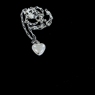Heart Pendant Necklace - SIlver – elegant pendant necklace with spiritual meaning by Jéy Jewels by Divya on black background