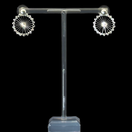 London Eye Medium Earrings – Silver – Circular design inspired by the London Eye – a modern symbol of London’s skyline, architectural jewellery on black background
