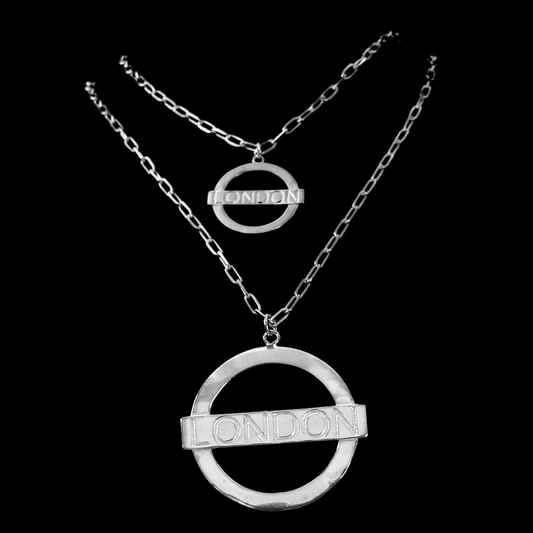 London Large Necklace – Silver – A tribute to London’s essence – elegant handcrafted jewellery inspired by its iconic cityscape, styled on a black backdrop. big and small size in one frame