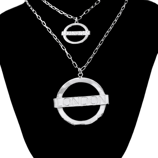 London Large Necklace – Silver – A tribute to London’s essence – elegant handcrafted jewellery inspired by its iconic cityscape, styled on a black backdrop big and small size in one frame