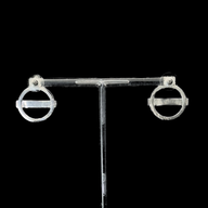 London Medium Earrings – Silver – A tribute to London’s essence – elegant handcrafted jewellery inspired by its iconic cityscape, styled on a black backdrop