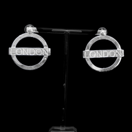 London Large Earrings – Silver – A tribute to London’s essence – elegant handcrafted jewellery inspired by its iconic cityscape, styled on a black backdrop