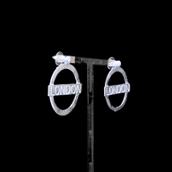 London Large Earrings – Silver – A tribute to London’s essence – elegant handcrafted jewellery inspired by its iconic cityscape, styled on a black backdrop