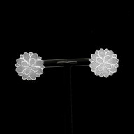 Elegant handcrafted silver magnolia floral stud earrings with a matte finish, designed by Jéy Jewels by Divya, inspired by nature’s delicate beauty.