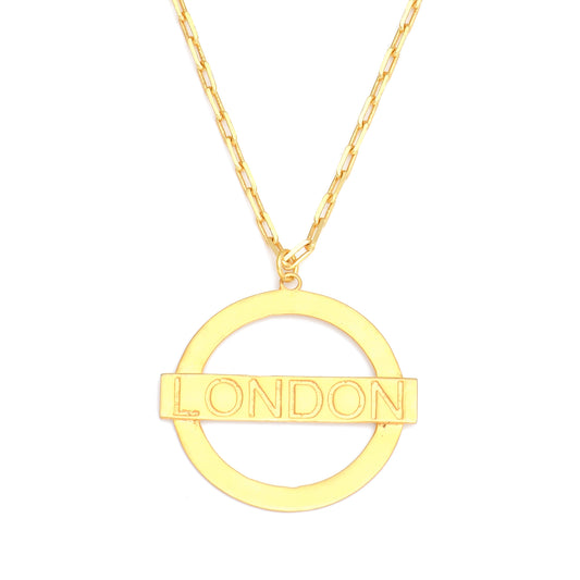 London Large Necklace – Gold – A tribute to London’s essence – elegant handcrafted jewellery inspired by its iconic cityscape, styled on a white backdrop zoom in