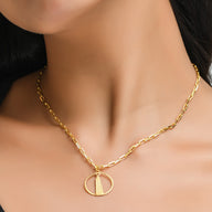 Shard Medium Necklace – Gold – Sleek silver or gold design inspired by The Shard – London’s tallest skyscraper, contemporary jewellery on Model neck zoom in