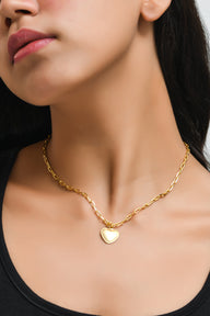 Heart Pendant Necklace Small - Gold – elegant pendant necklace with spiritual meaning by Jéy Jewels by Divya on model neck
