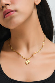 OM Pendant Necklace Small – Gold – elegant pendant necklace with spiritual meaning by Jéy Jewels by Divya on model neck